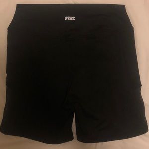 Pink bike shorts with mesh detail and side pocket!